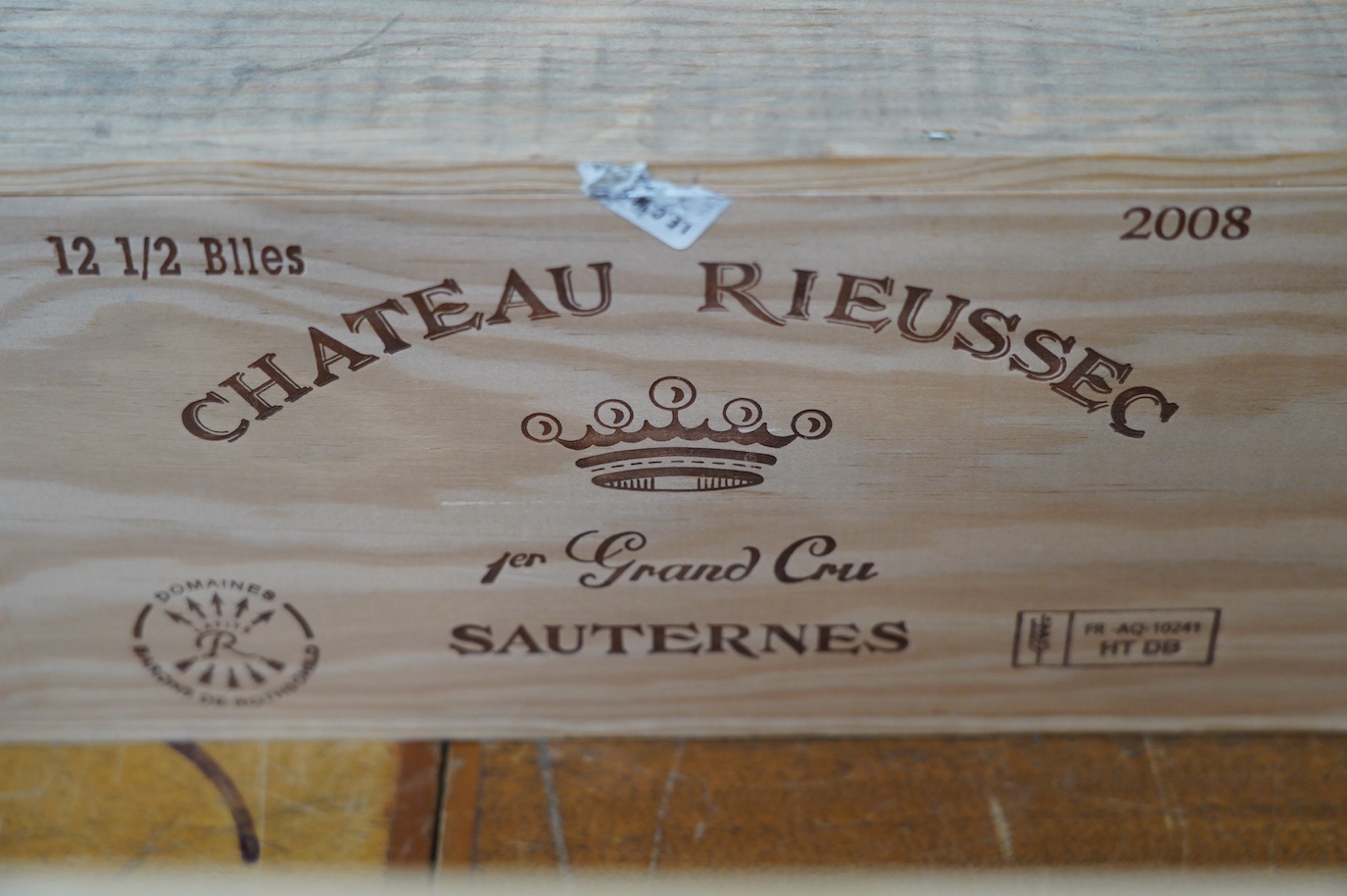 A sealed case of twelve half bottles of 2008 Chateau Rieussec, Sauternes, in OWC, purchased en primeur from The Wine Society. Condition - good